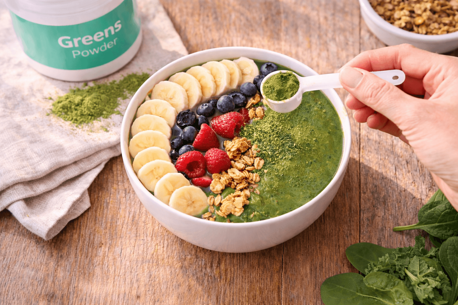 Multiple greens powder scoops in different shades of green lined up for comparison